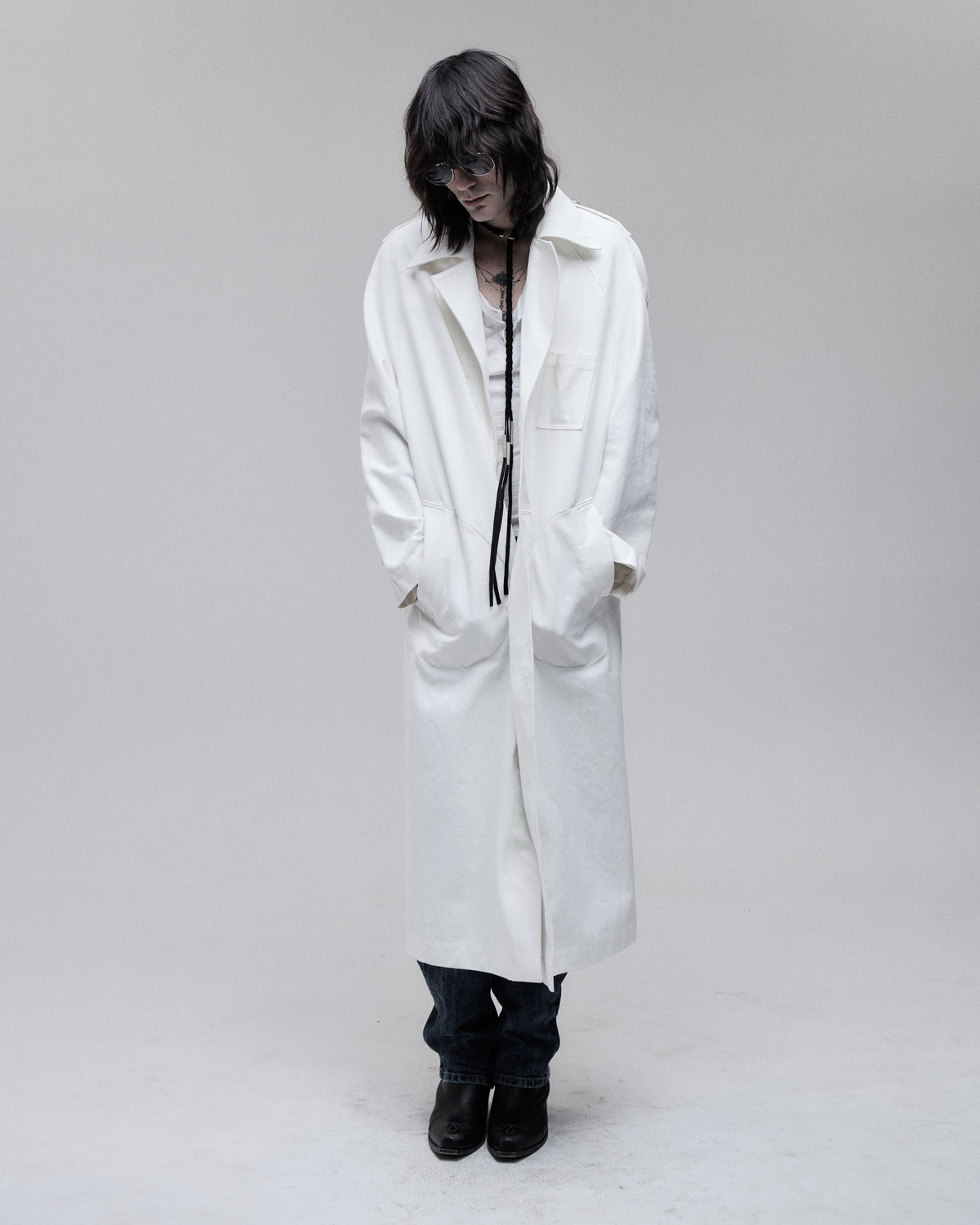 Canvas Overcoat in white duck canvas, front view on model