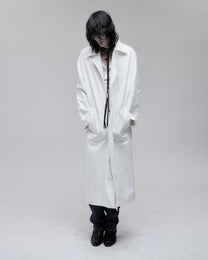 Canvas Overcoat in white duck canvas, front view on model