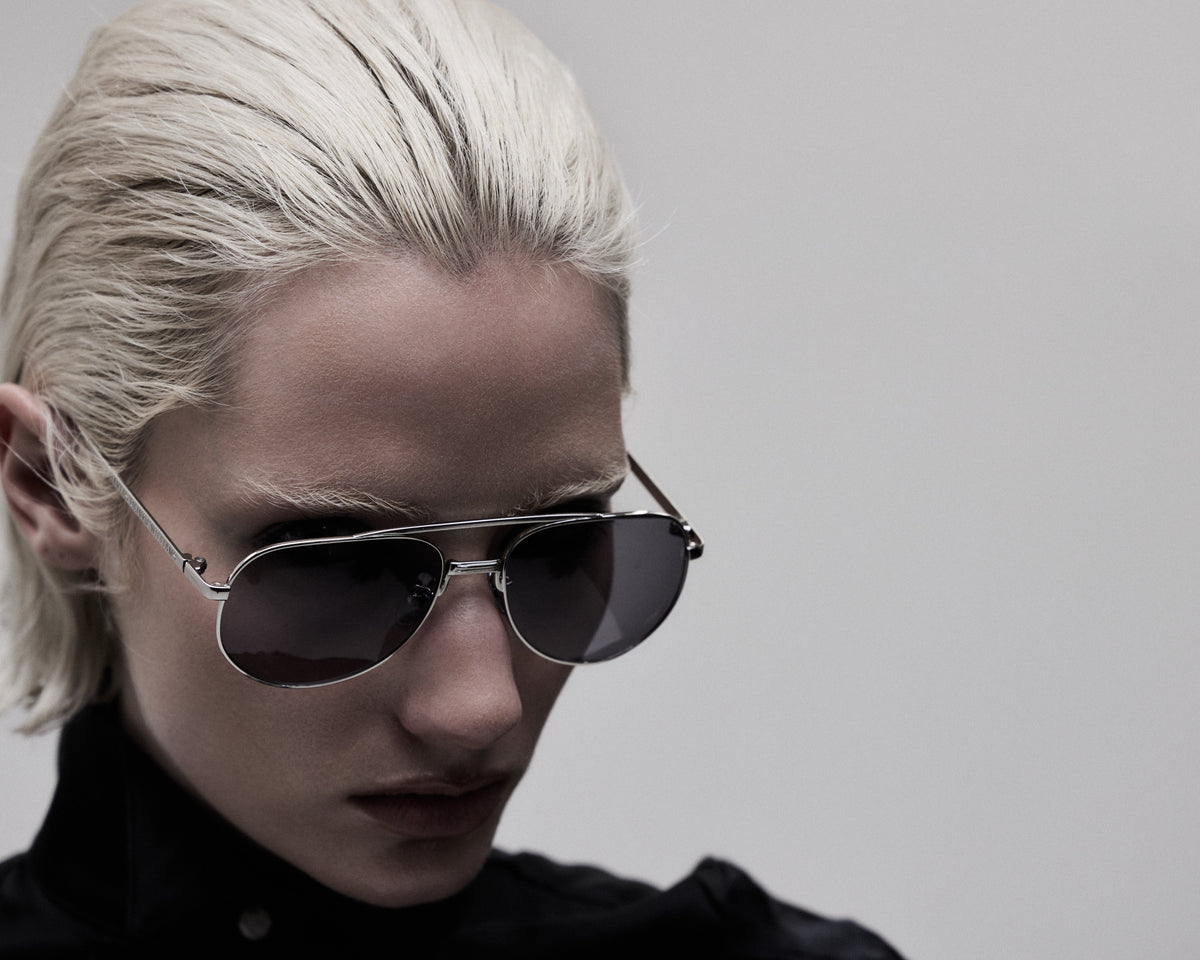 Aviator 001 sunglasses, close-up three-quarter view on model
