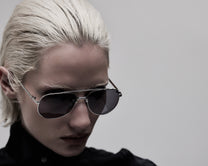 Aviator 001 sunglasses, close-up three-quarter view on model