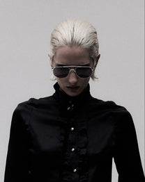 Aviator 001 sunglasses with silver frame and blue lenses, worn on model