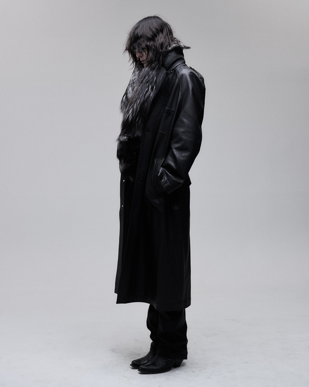 Daddy Leather Coat in black, three-quarter view on model