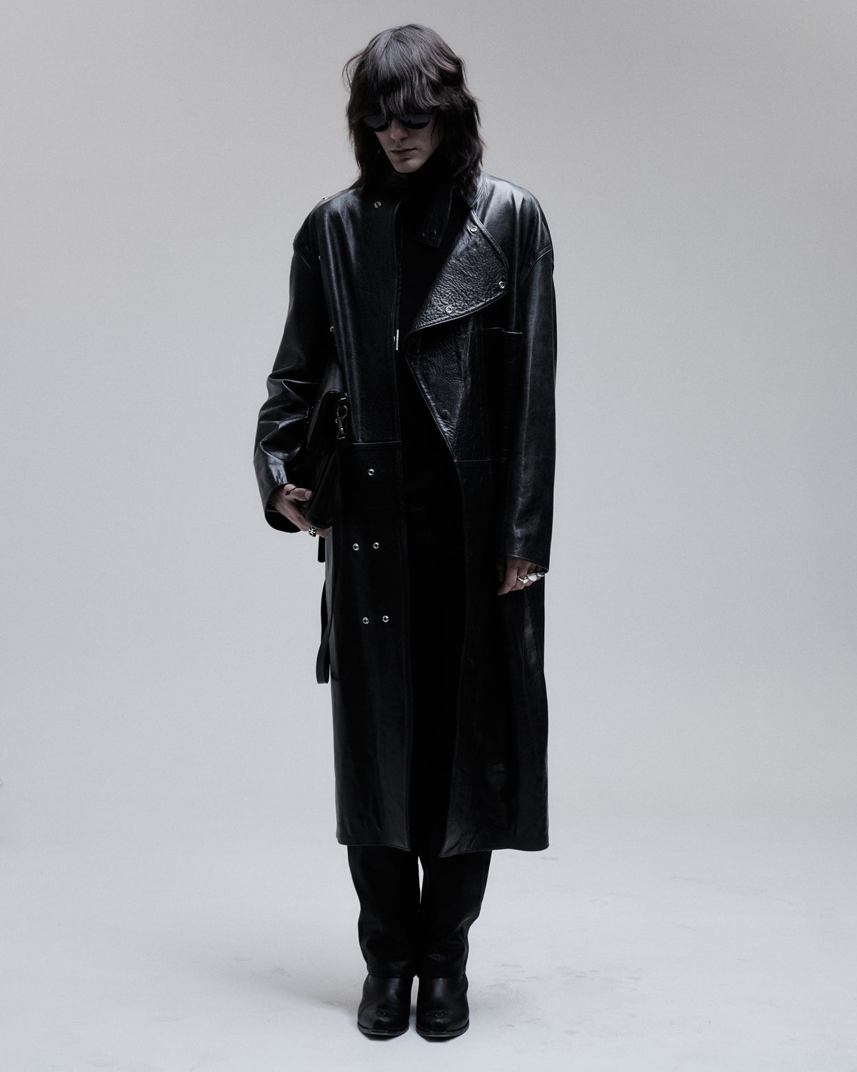 Jeffrey Coat asymmetric leather overcoat in black, front view on model