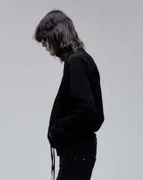 Suede Bomber jacket in black, side view on model