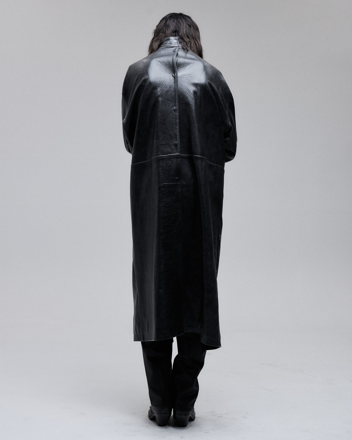 Jeffrey Coat in black, back view on model