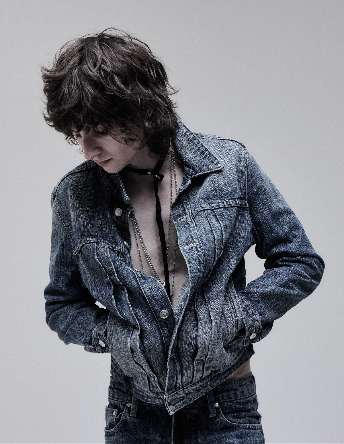 Hollywood Denim Jacket in washed blue, worn open on model