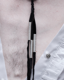 Tassel necklace, close-up of the silver tips
